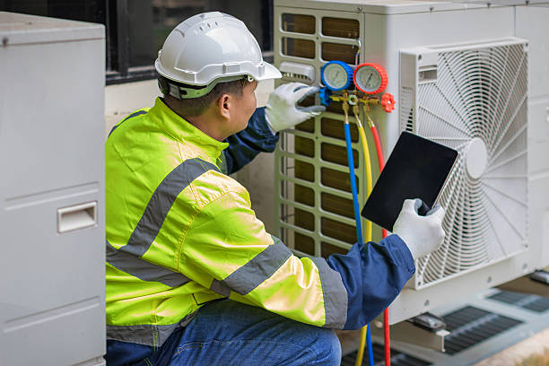 Professional Ac Installation technician working in Westphalia, IN